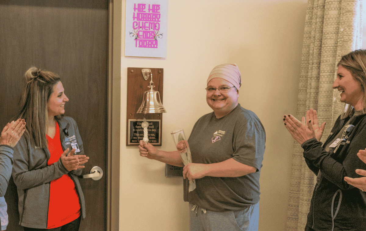 Heather Krisay Heather Krisay ringing the bell after her final cancer treatment